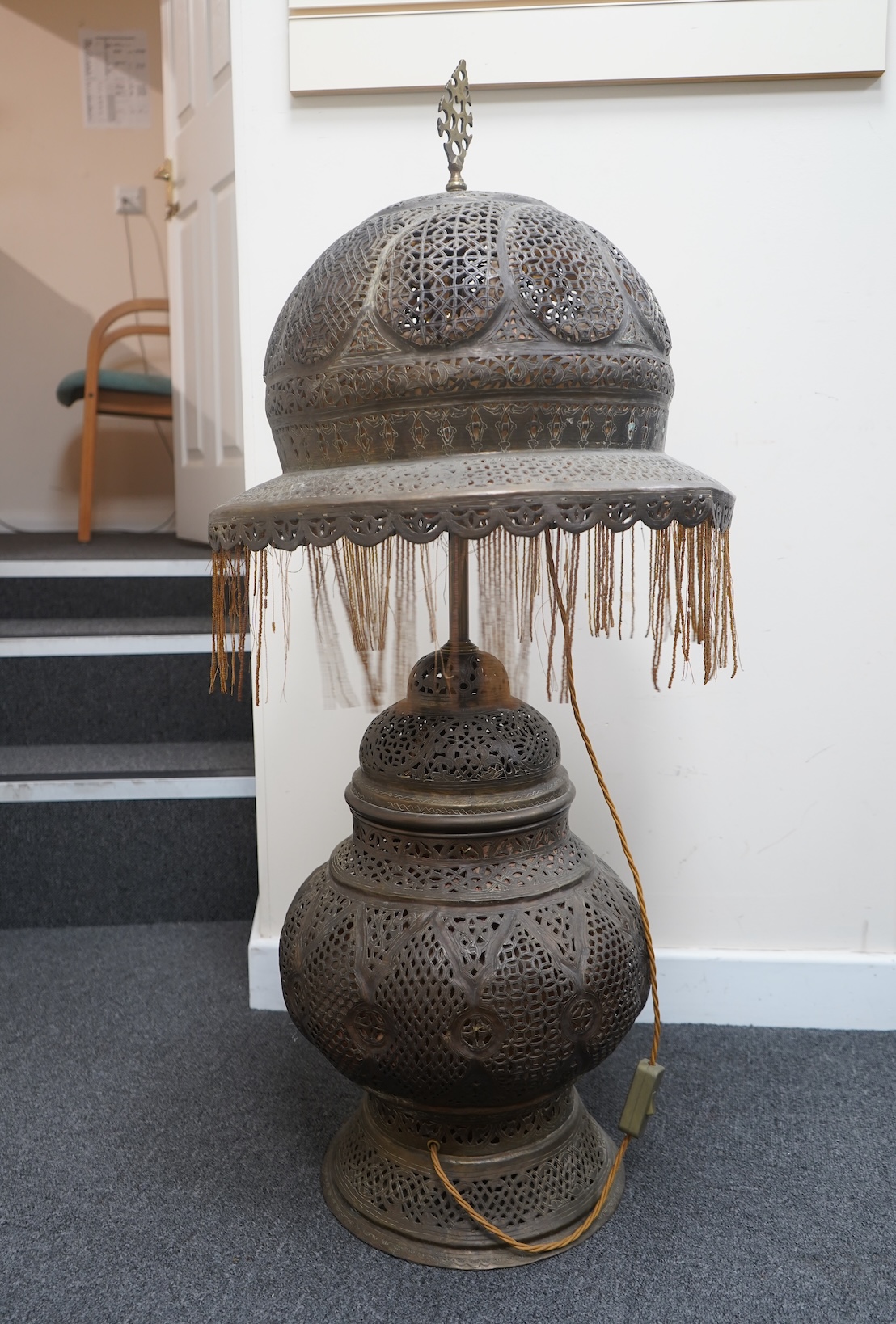 A large Moroccan pierced brass lamp and shade, 20th century